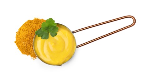 Photo of Saucepan with tasty curry sauce, powder and parsley isolated on white, top view