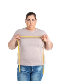 Photo of Overweight woman with measuring tape on white background