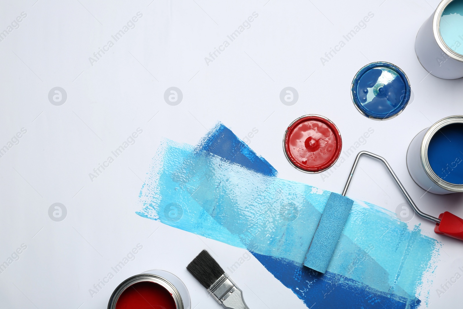 Photo of Composition with paint cans and space for text on white background