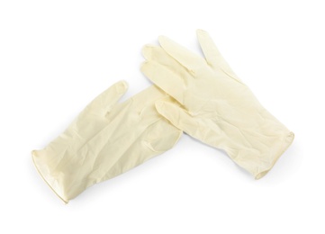 Photo of Pair of medical gloves isolated on white, top view