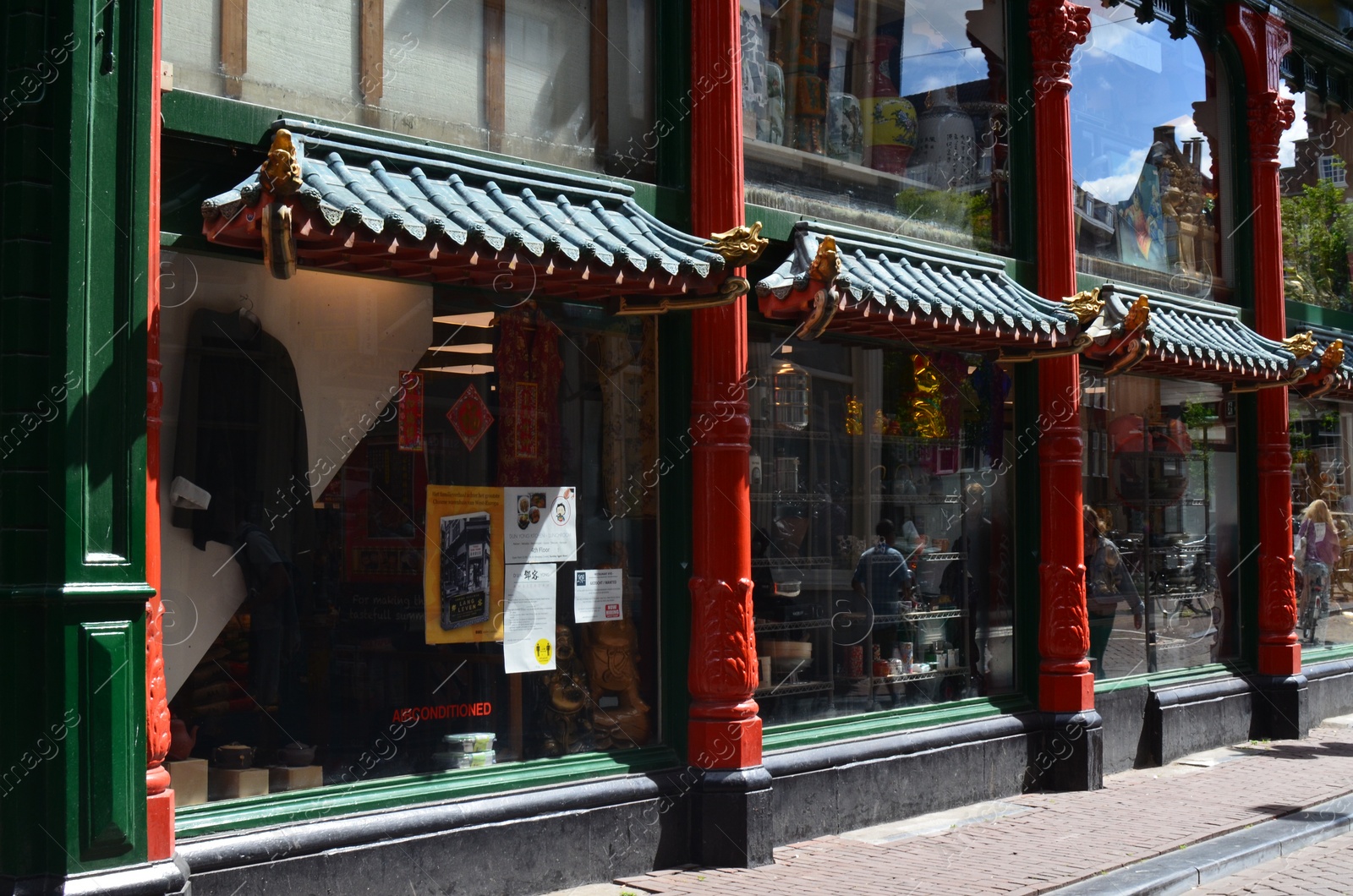 Photo of AMSTERDAM, NETHERLANDS - JULY 16, 2022: Beautiful facade of shop at Chinatown, view from outdoors