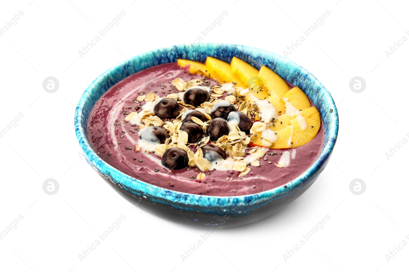 Photo of Bowl with tasty acai smoothie on white background