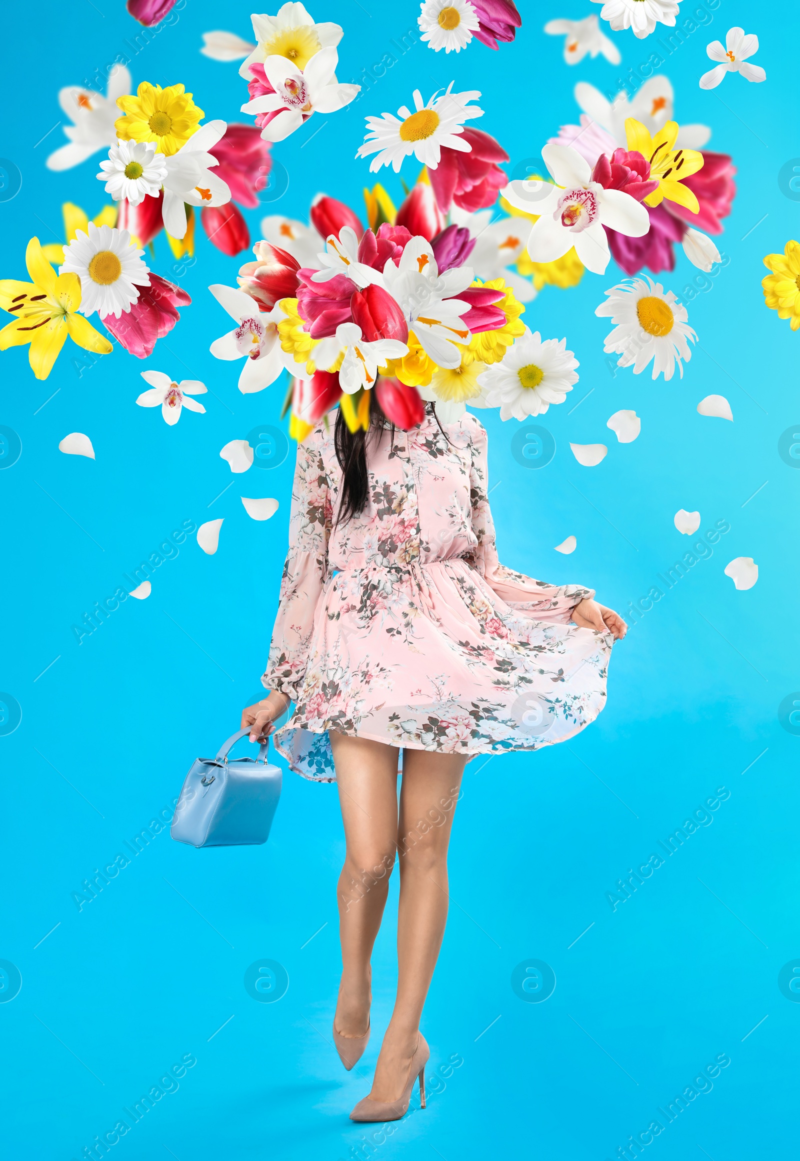 Image of Creative spring fashion composition. Walking girl and flowers splash