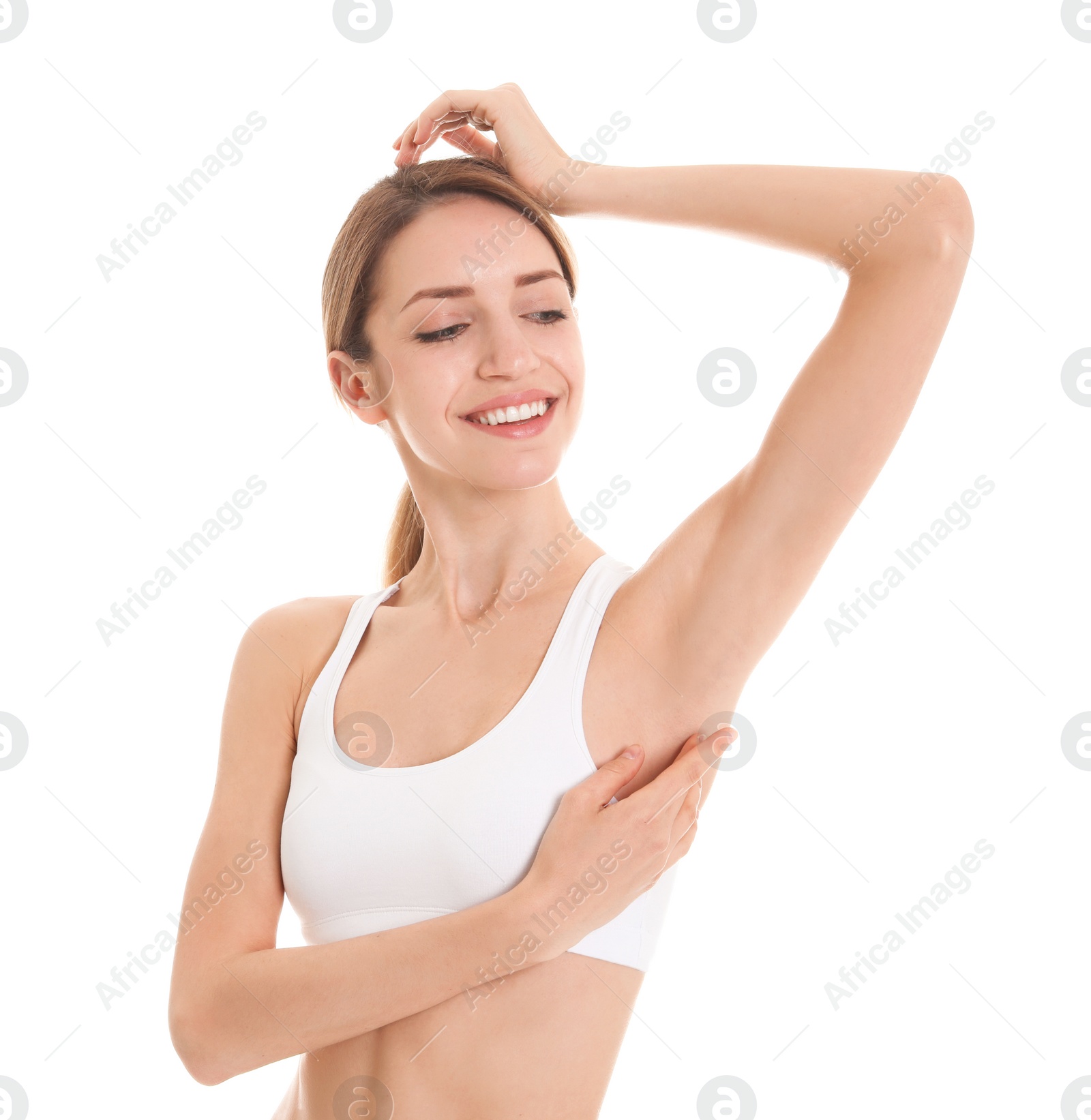 Photo of Young woman showing smooth silky skin after epilation on white background