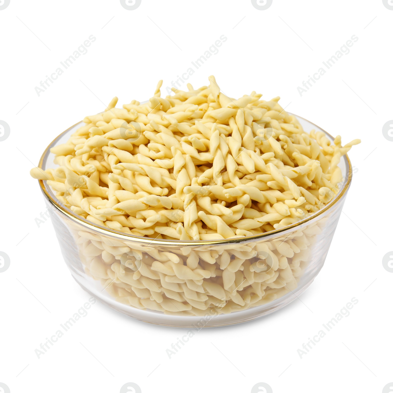 Photo of Uncooked trofie pasta in bowl isolated on white