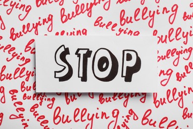 Photo of Composition with text Stop Bullying on white background, top view