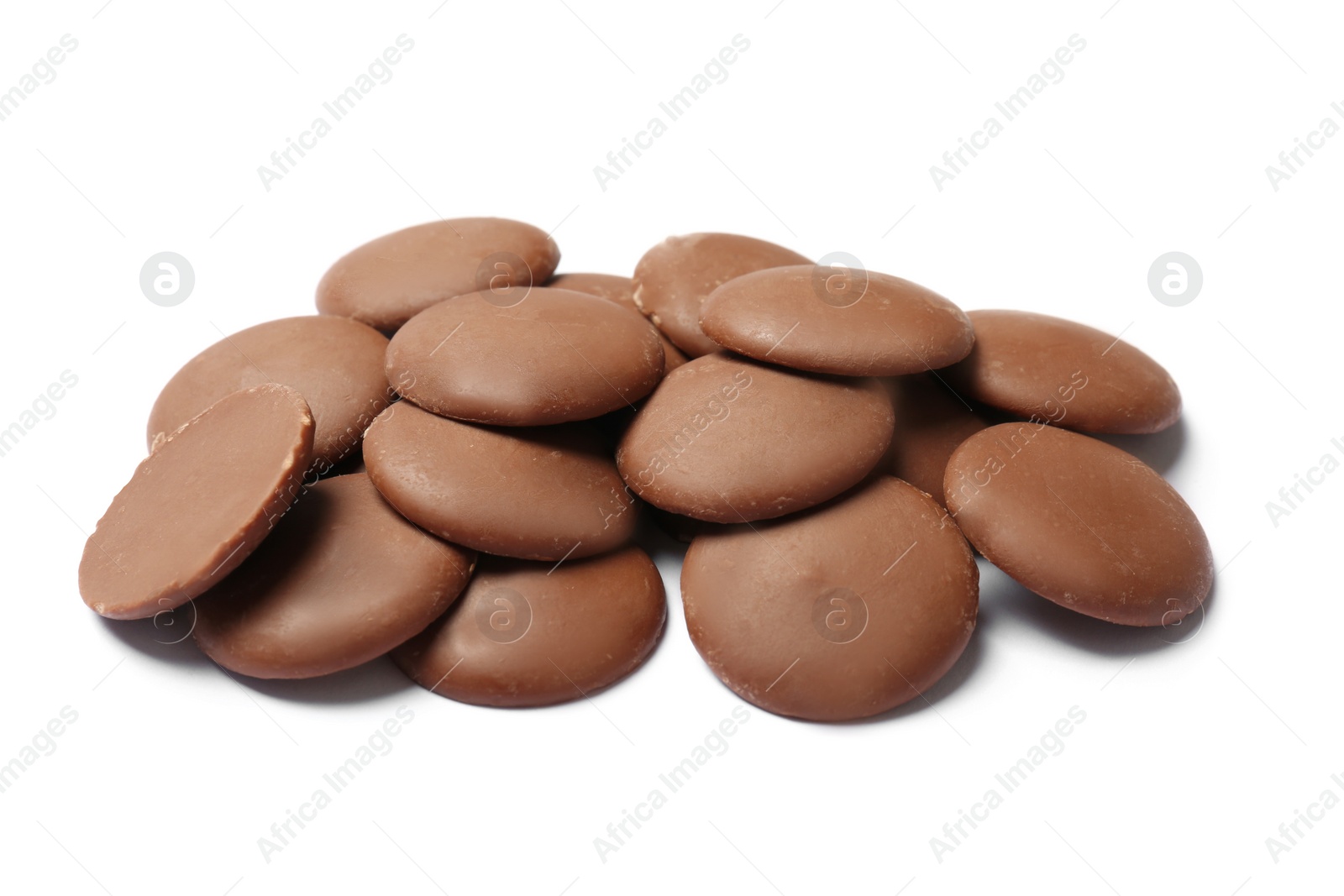 Photo of Delicious milk chocolate chips on white background