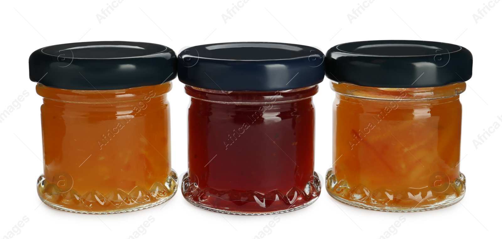 Photo of Jars with different jams on white background