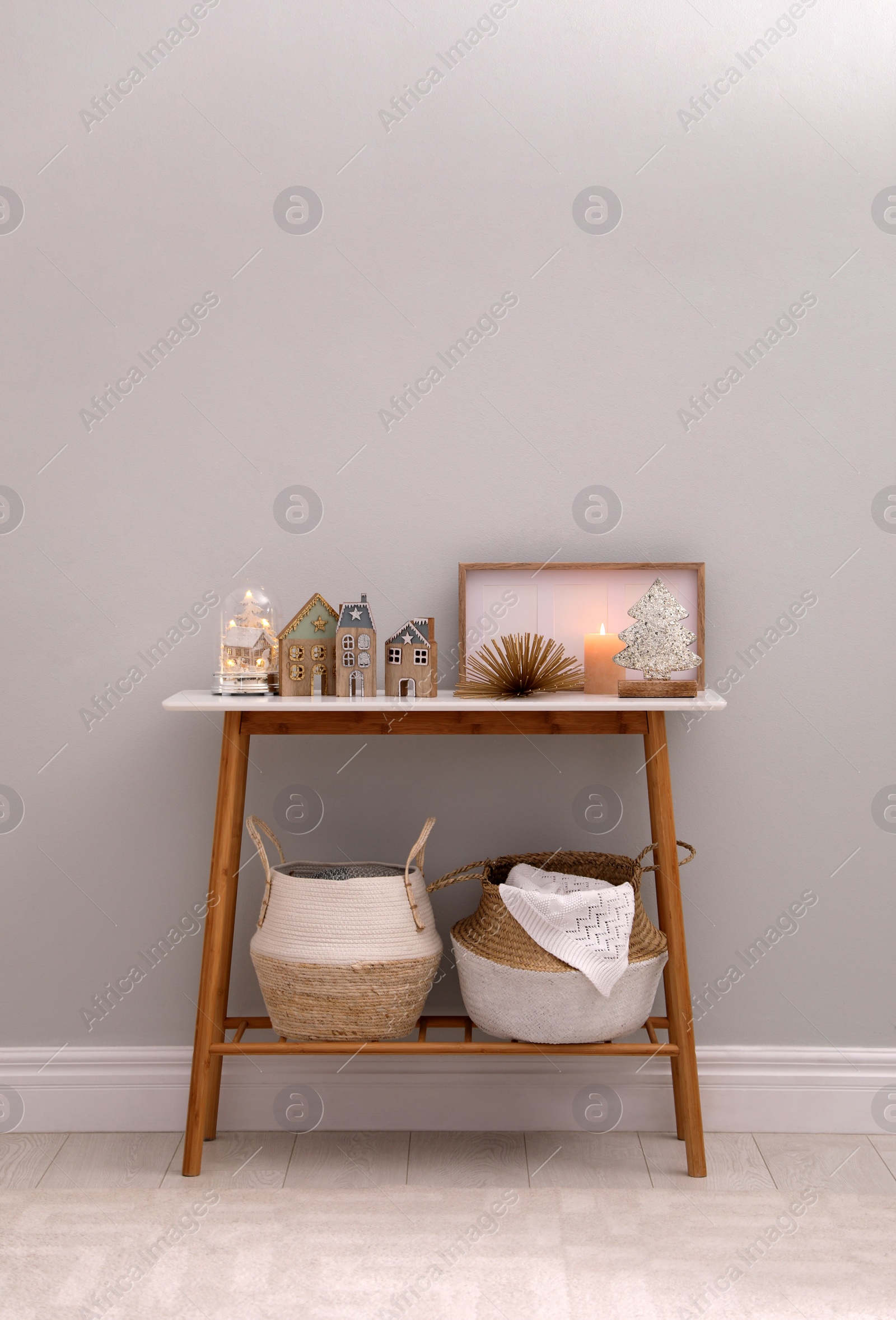 Photo of Modern room interior with table near light wall