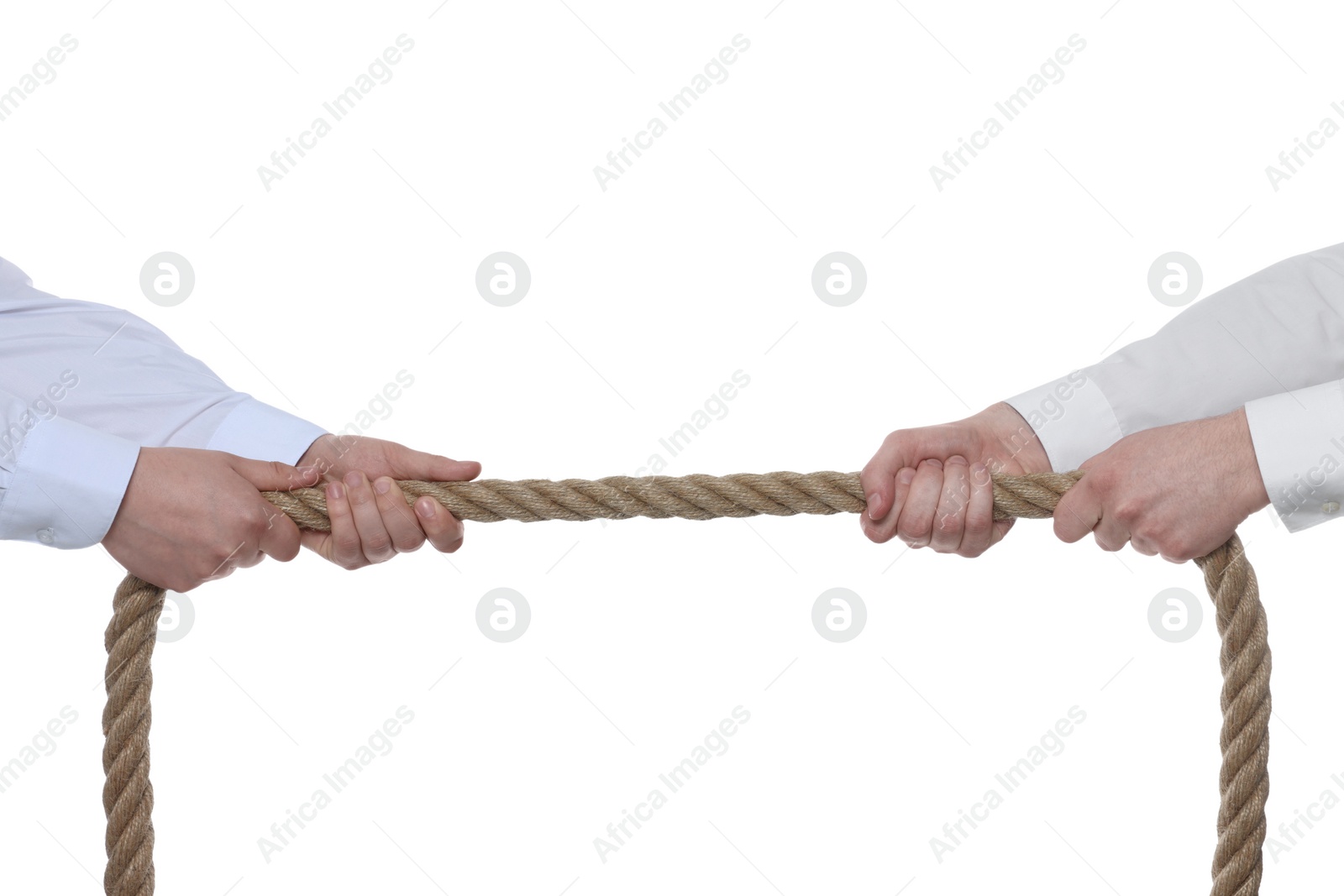 Photo of Dispute concept. Men pulling rope on white background, closeup