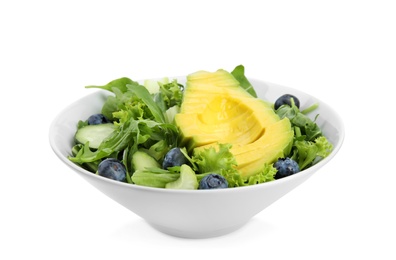 Delicious avocado salad with blueberries in bowl on white background