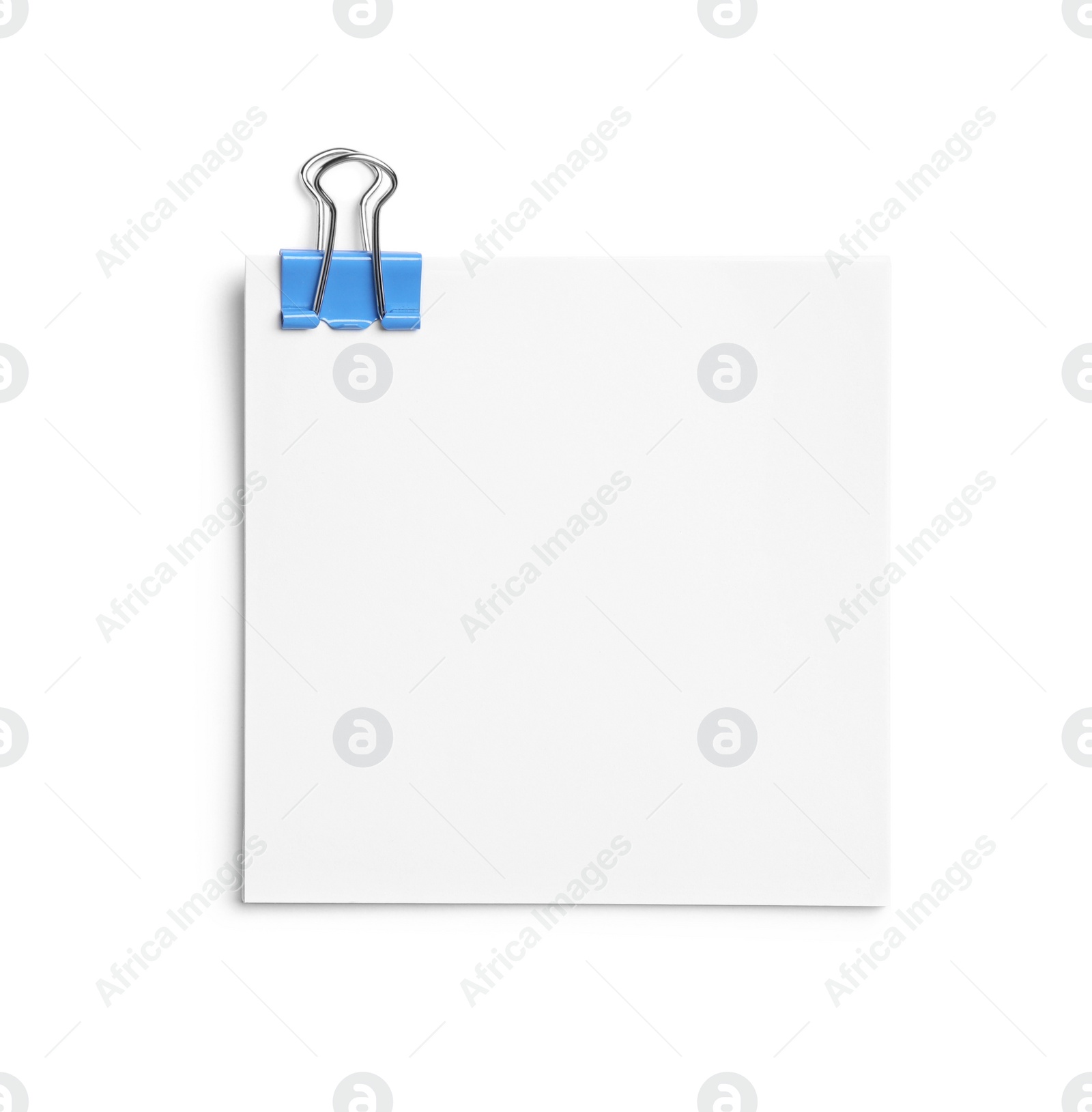 Photo of Note paper with clip isolated on white, top view