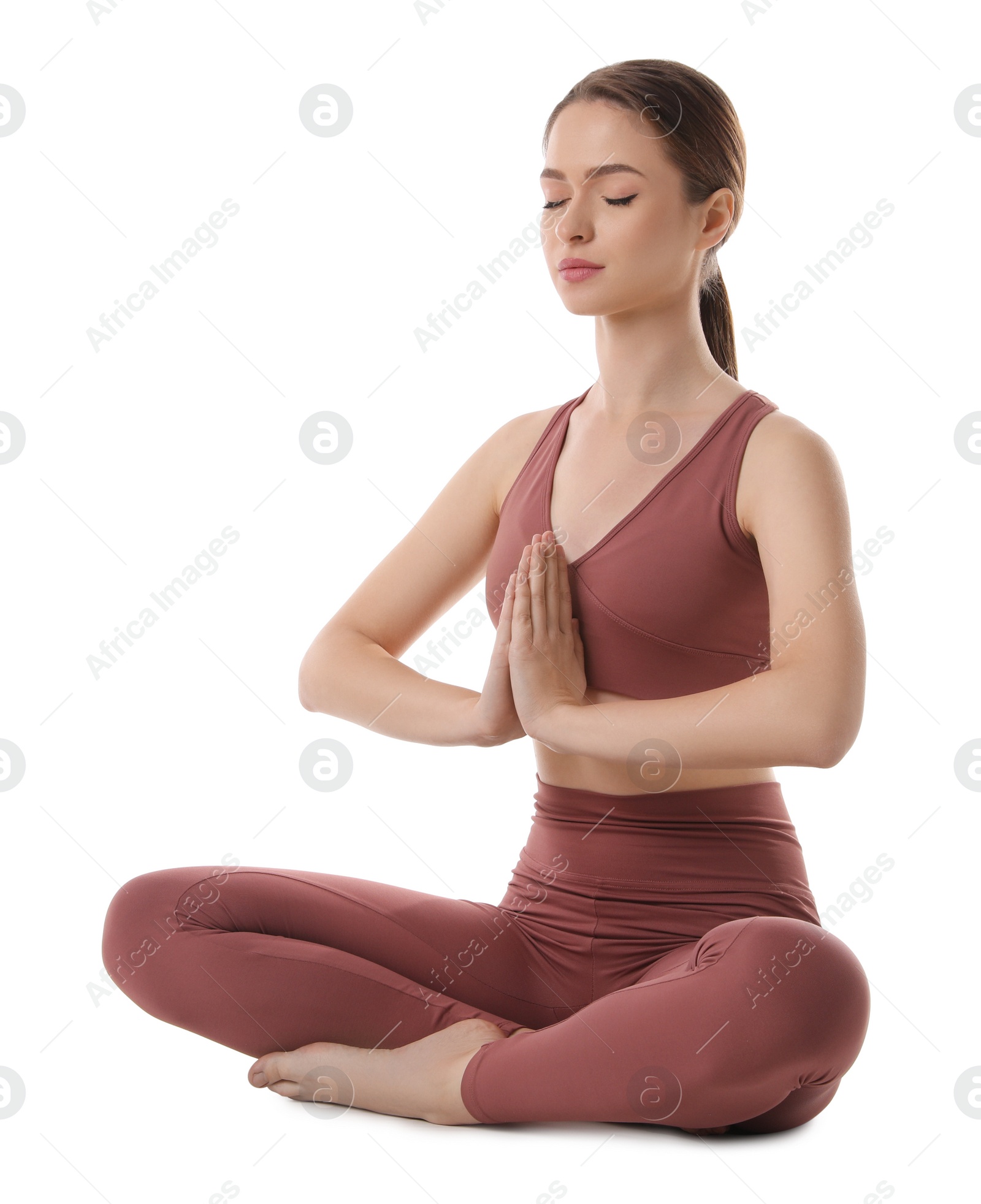 Photo of Beautiful young woman meditating on white background