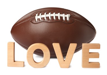 American football ball and word Love on white background