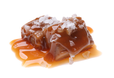 Delicious salted caramel with sauce on white background