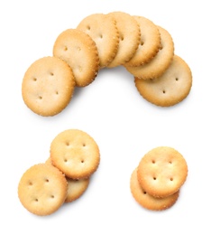 Set of tasty crispy crackers on white background, top view