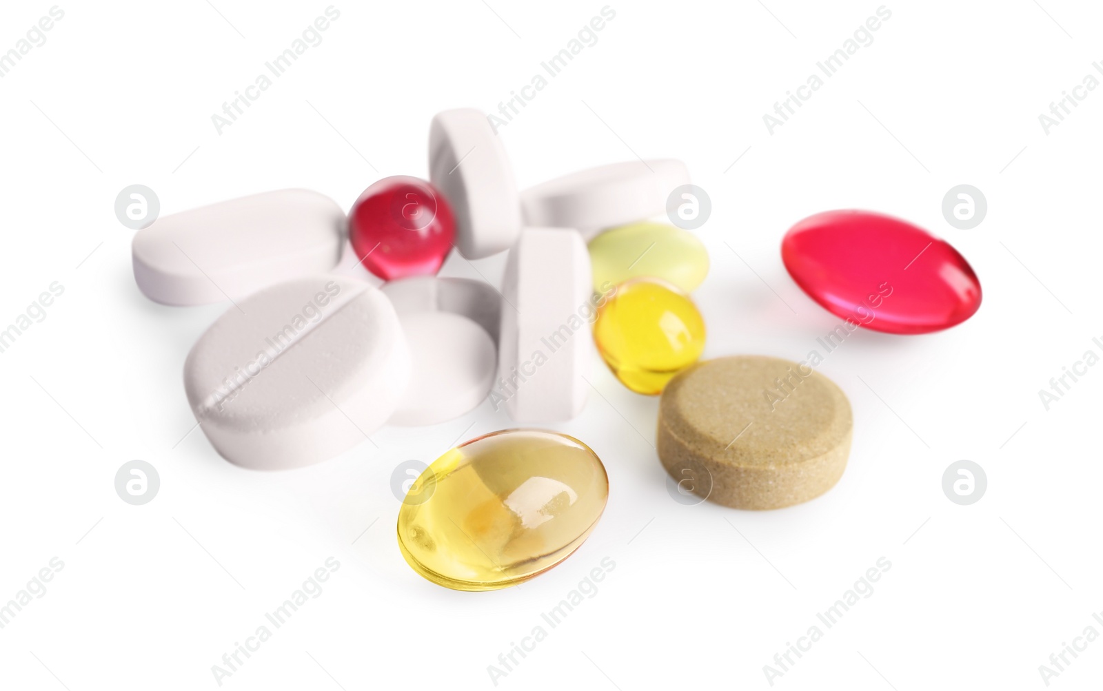 Photo of Many different pills isolated on white. Medicinal treatment