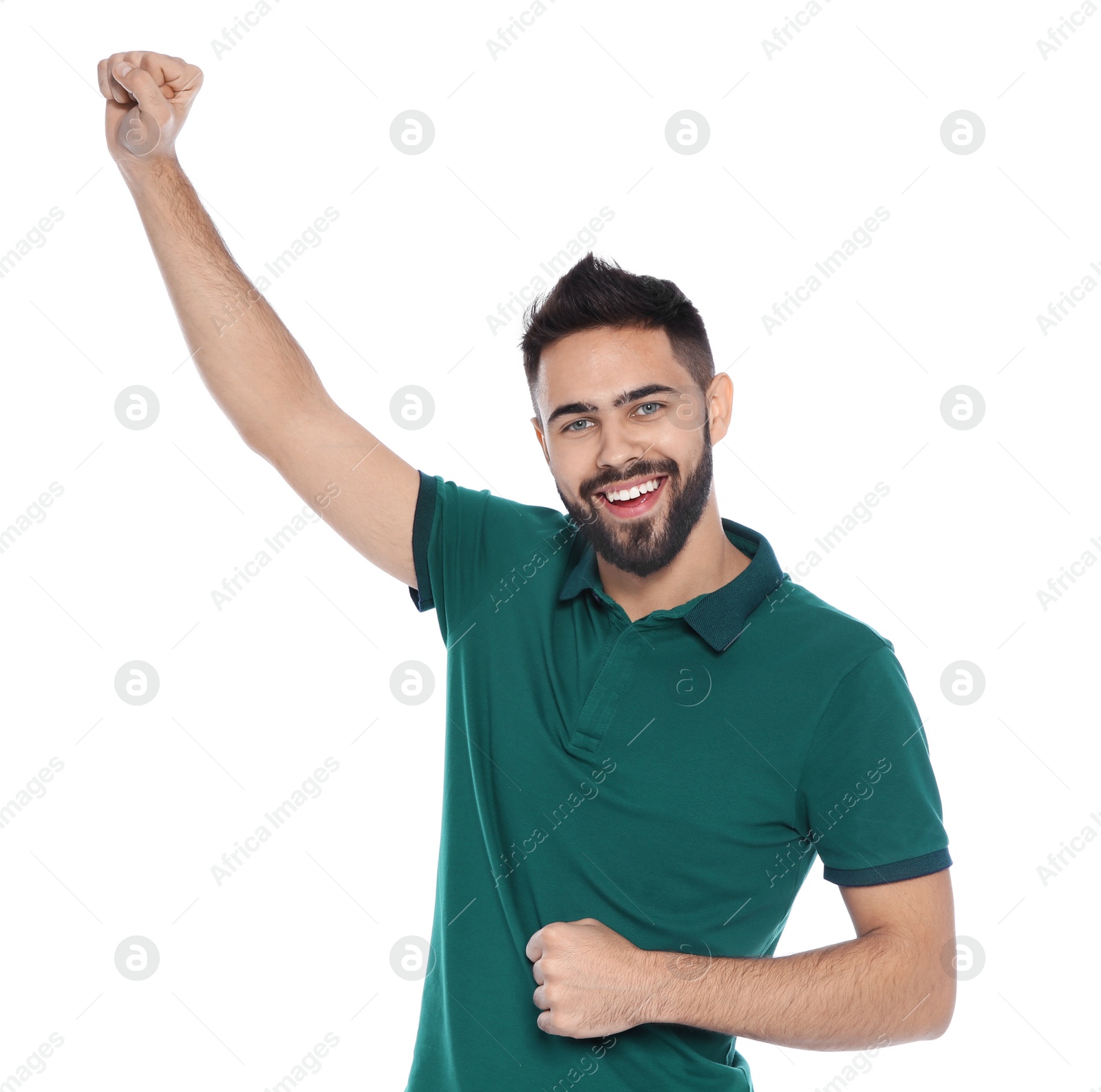 Photo of Happy young man celebrating victory on white background