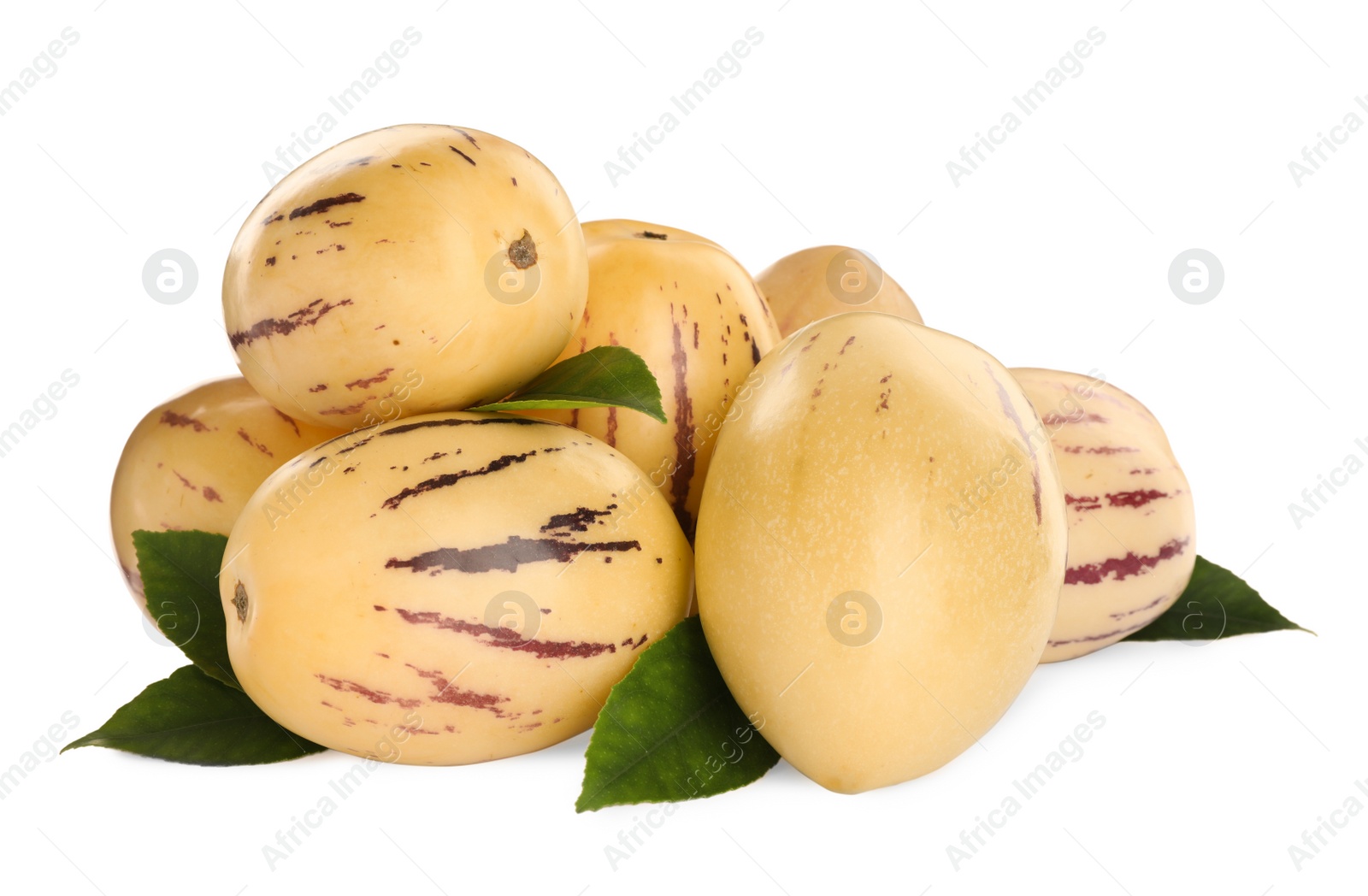 Photo of Fresh ripe pepino melons with green leaves on white background