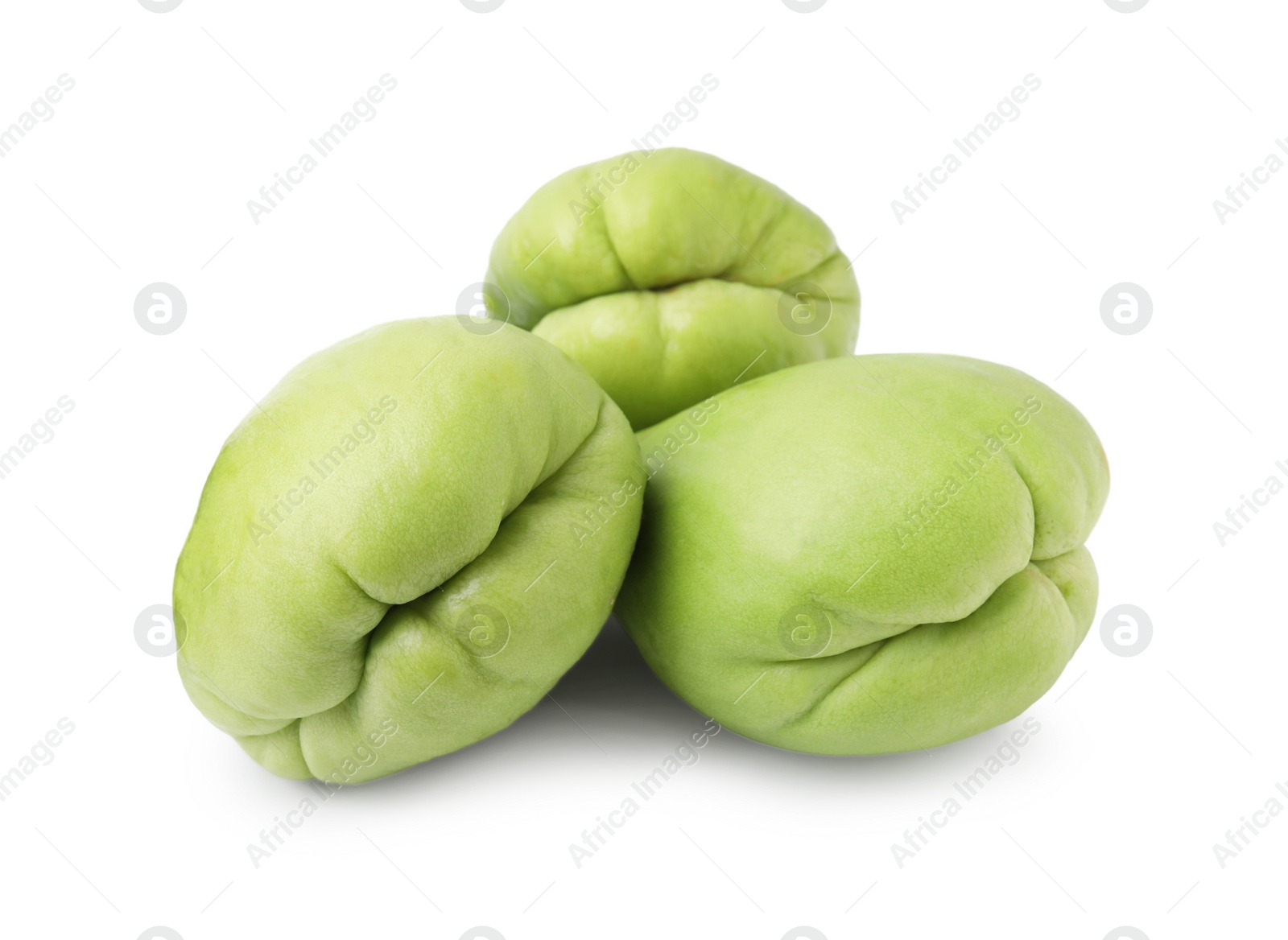 Photo of Many fresh green chayote isolated on white