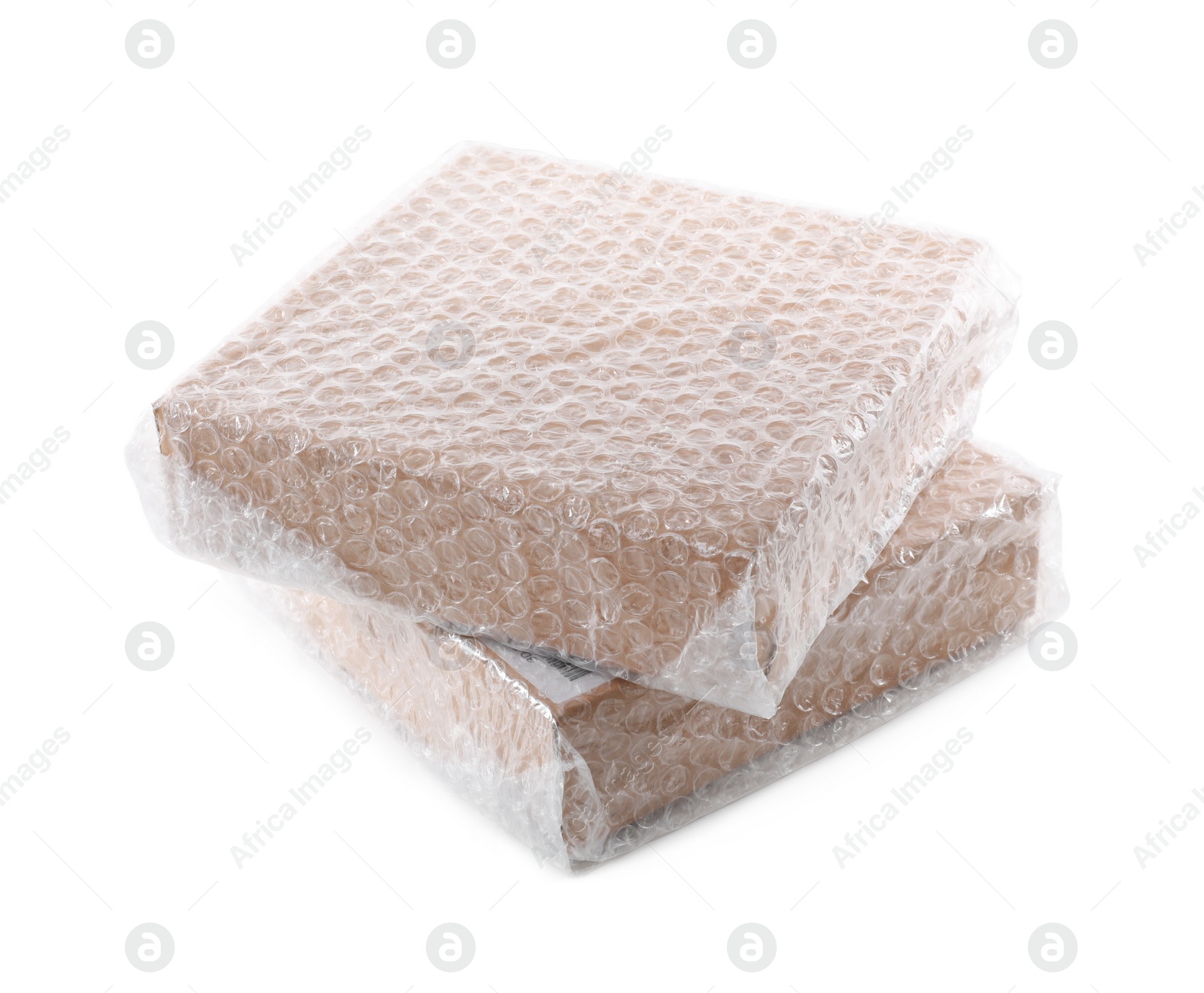 Photo of Cardboard boxes packed in bubble wrap on white background