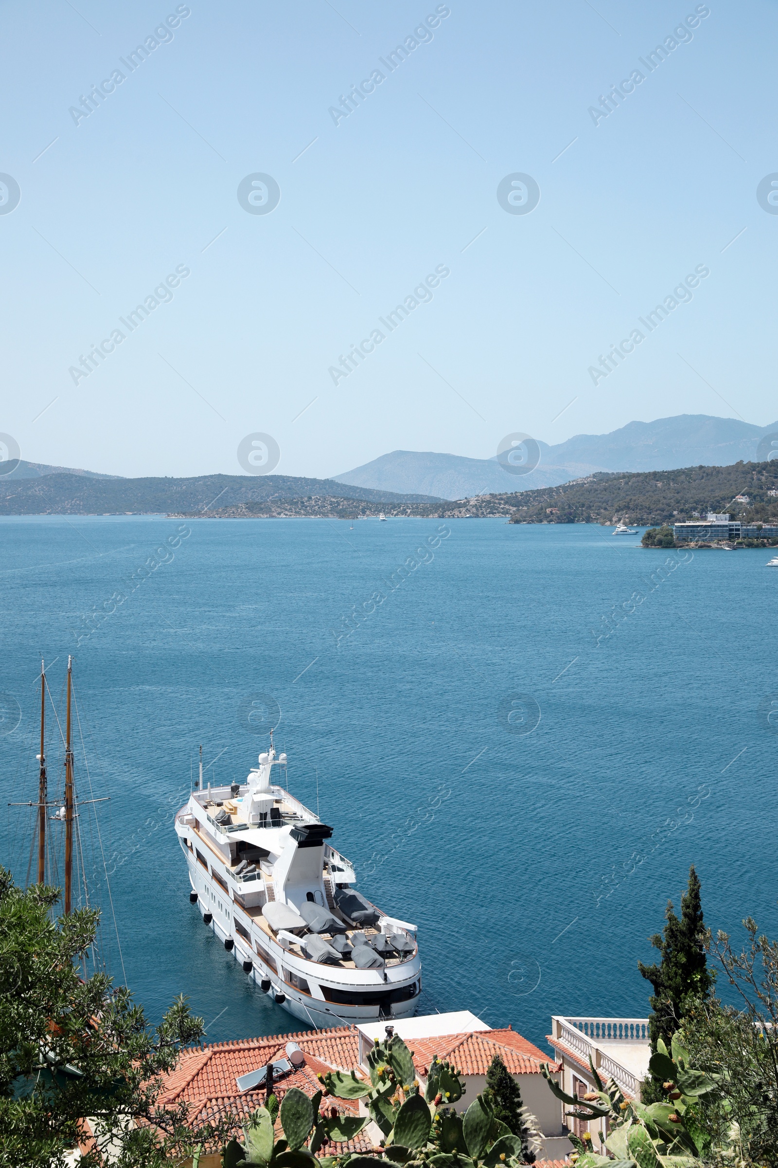 Photo of Beautiful view of sea coast with boat on sunny day