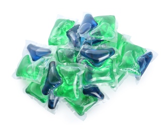 Heap of laundry capsules on white background, top view
