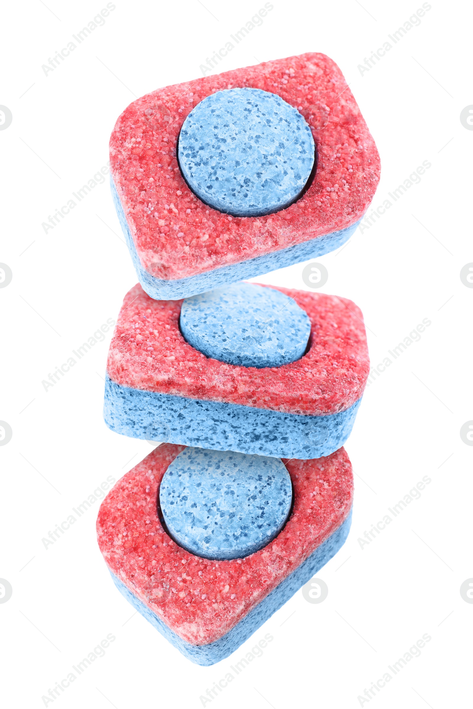 Image of Dishwasher detergent tablets falling on white background 