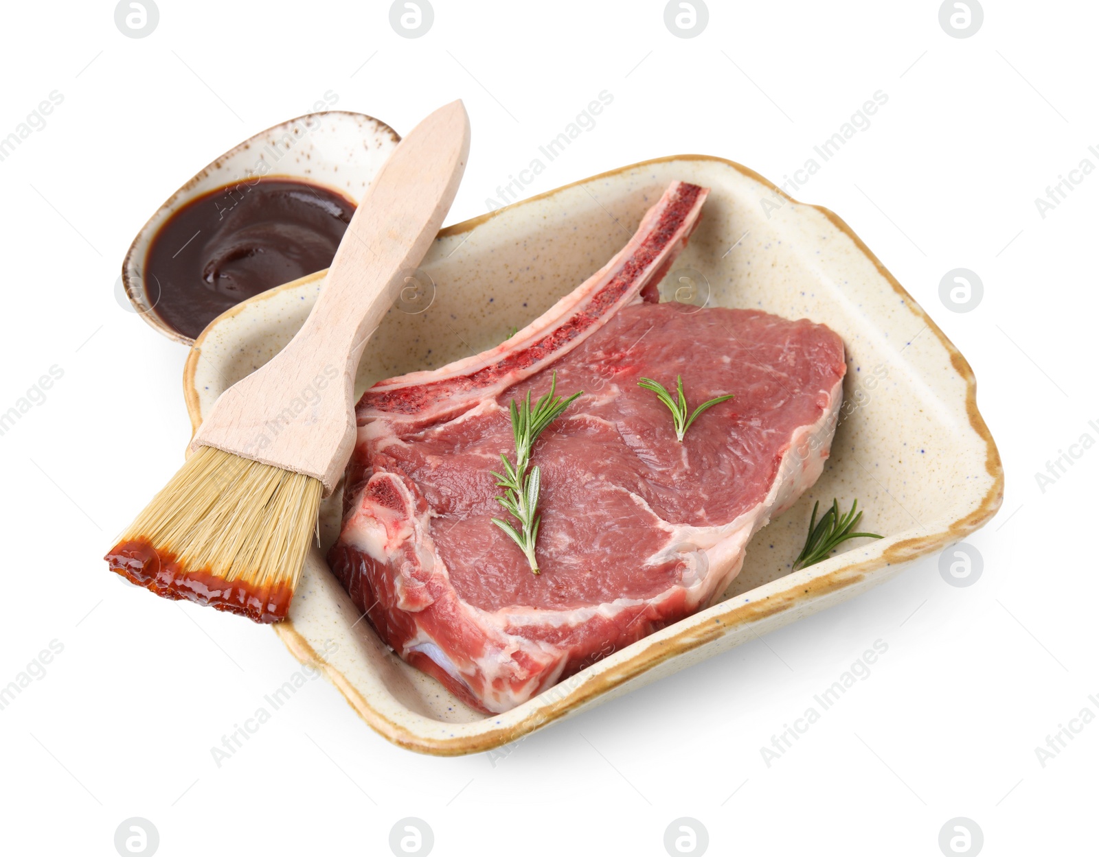 Photo of Raw meat, rosemary and brush with marinade isolated on white