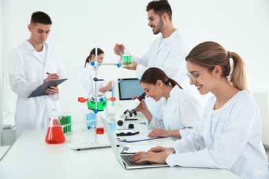 Medical students working in modern scientific laboratory