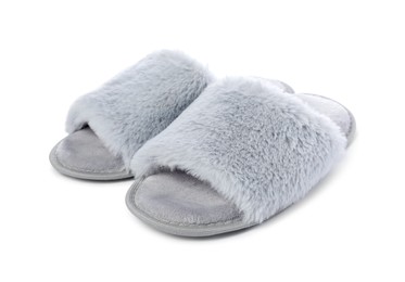 Photo of Pair of soft slippers with fur isolated on white