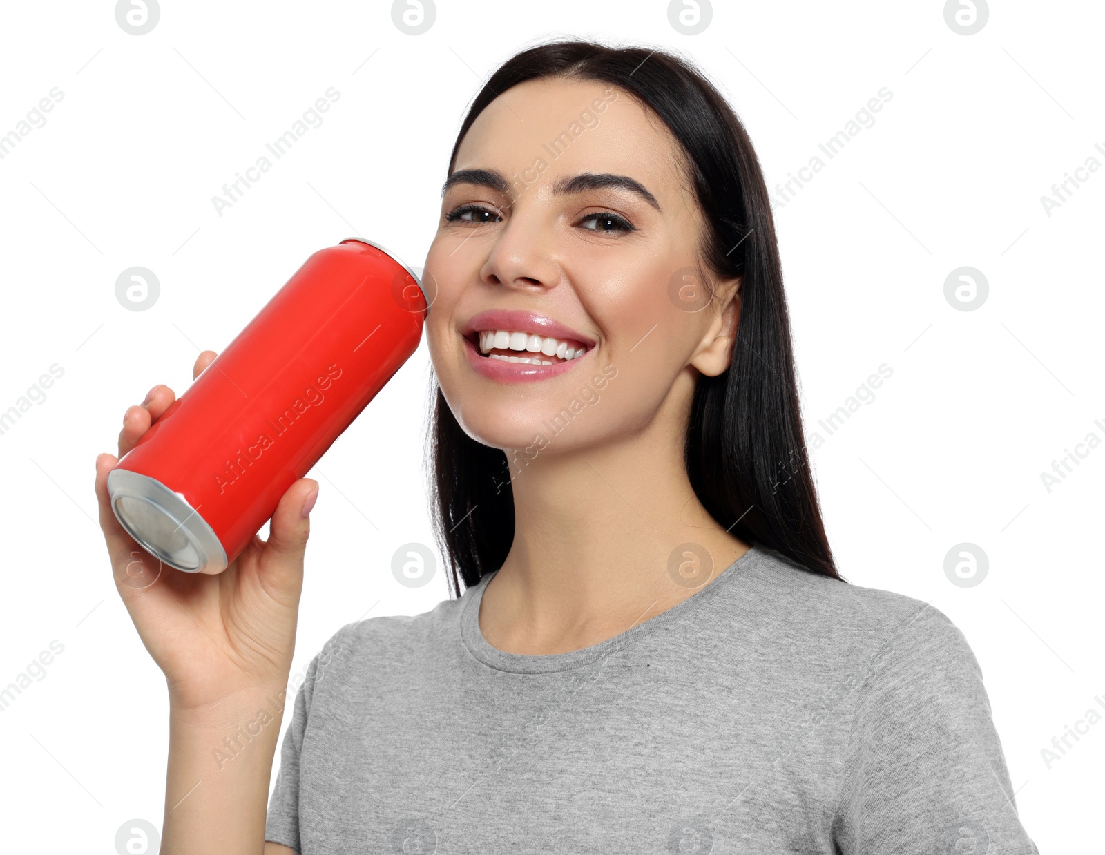 Photo of Beautiful happy woman holding red beverage can on white background