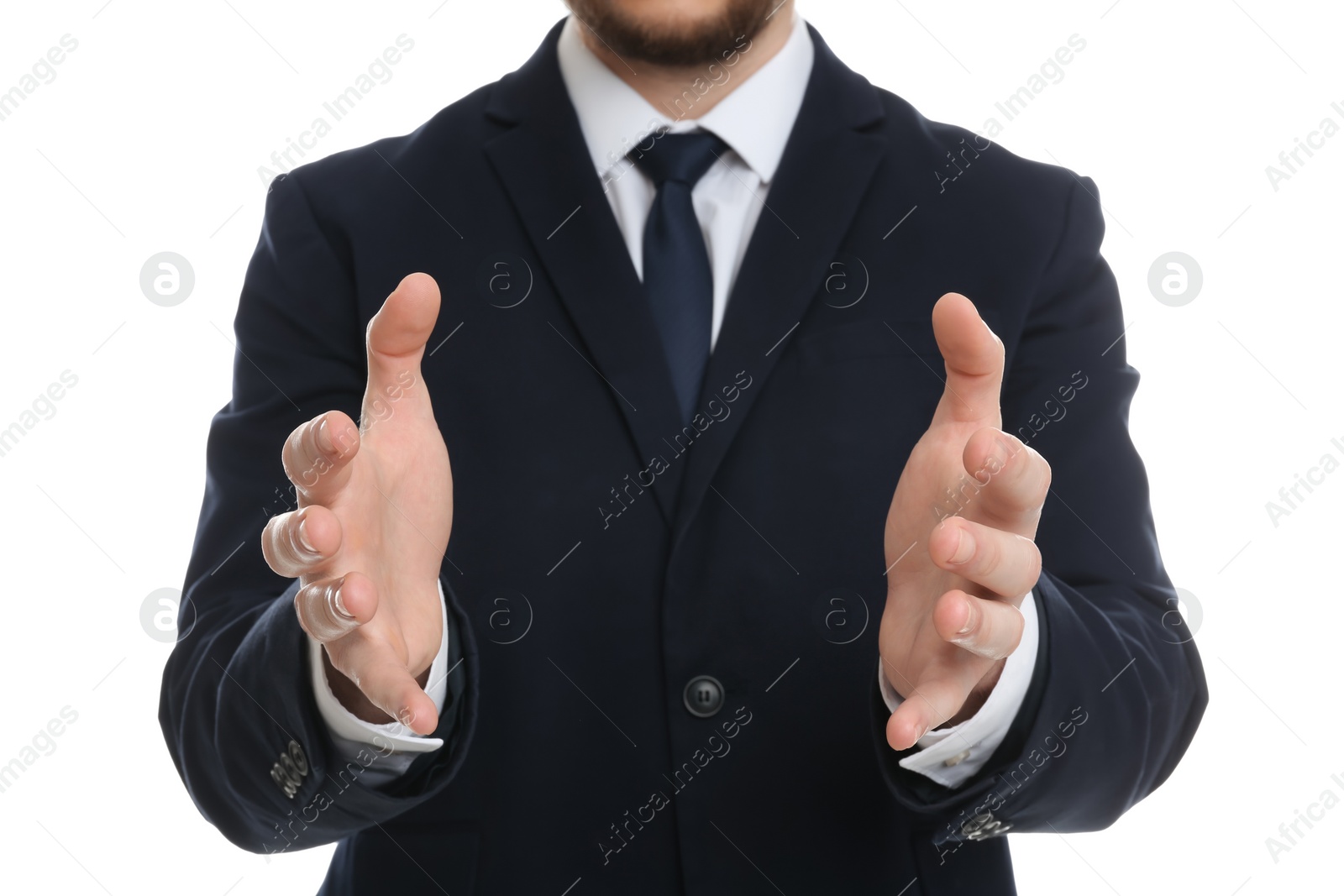 Photo of Businessman holding something against white background, focus on hands