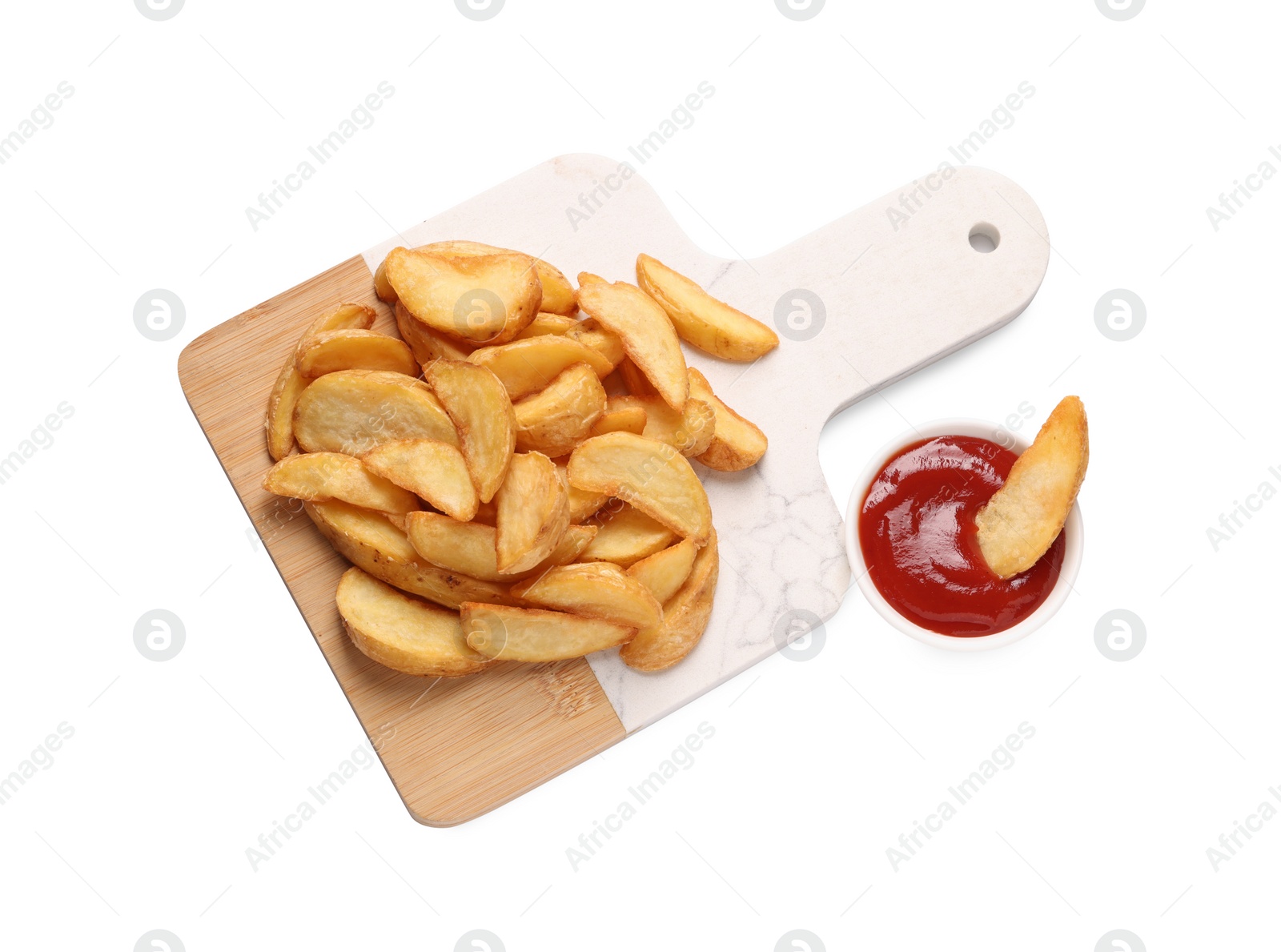 Photo of Delicious baked potato wedges and ketchup in bowl on white background, top view