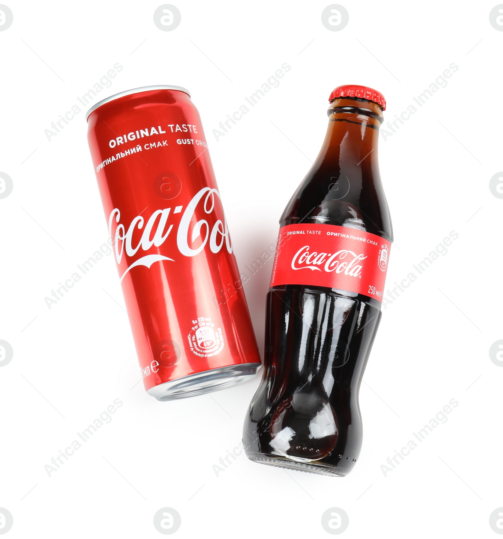 Photo of MYKOLAIV, UKRAINE - NOVEMBER 15, 2018: Can and bottle of Coca Cola on white background, top view