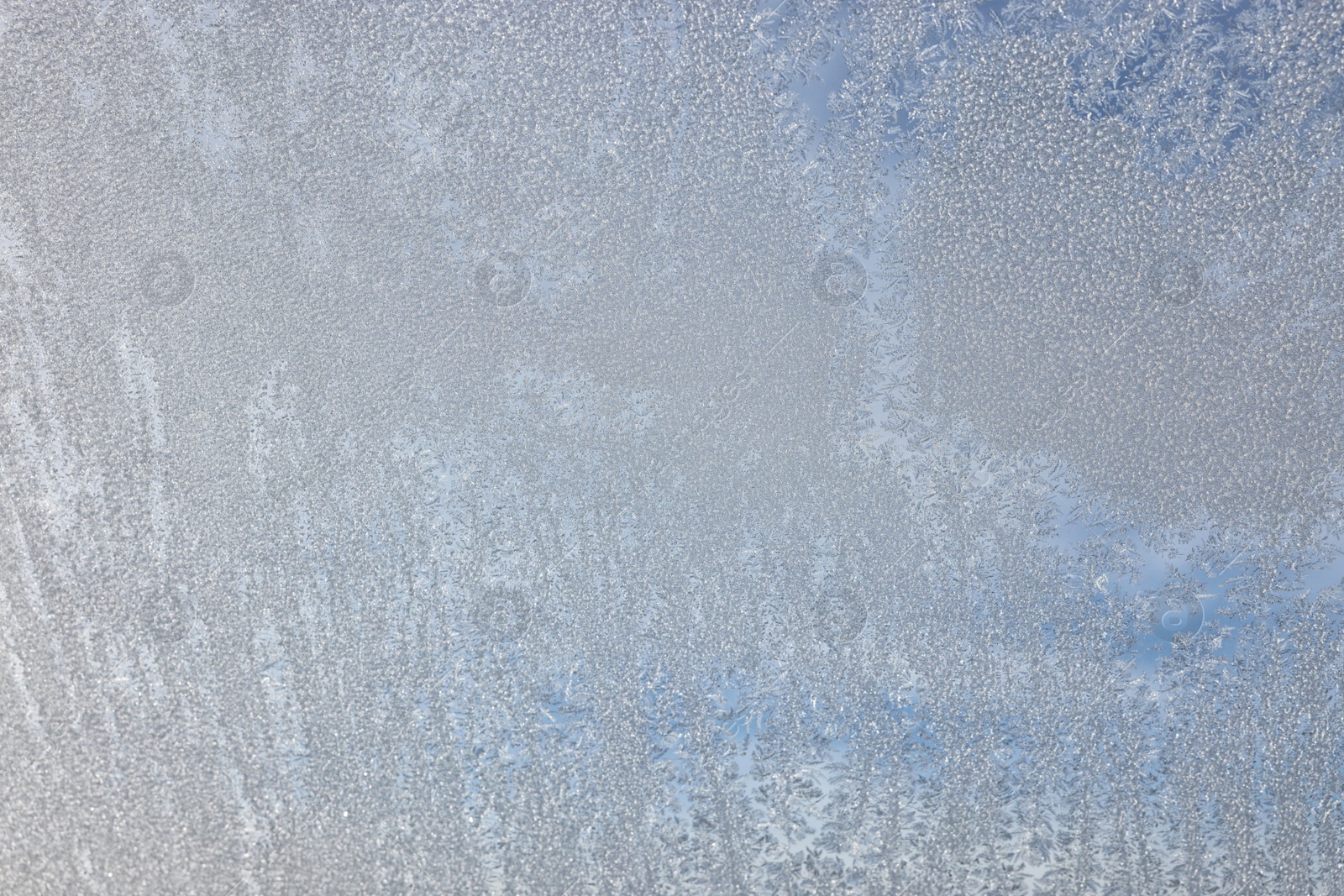 Photo of Beautiful frosty window as background, closeup. Winter morning