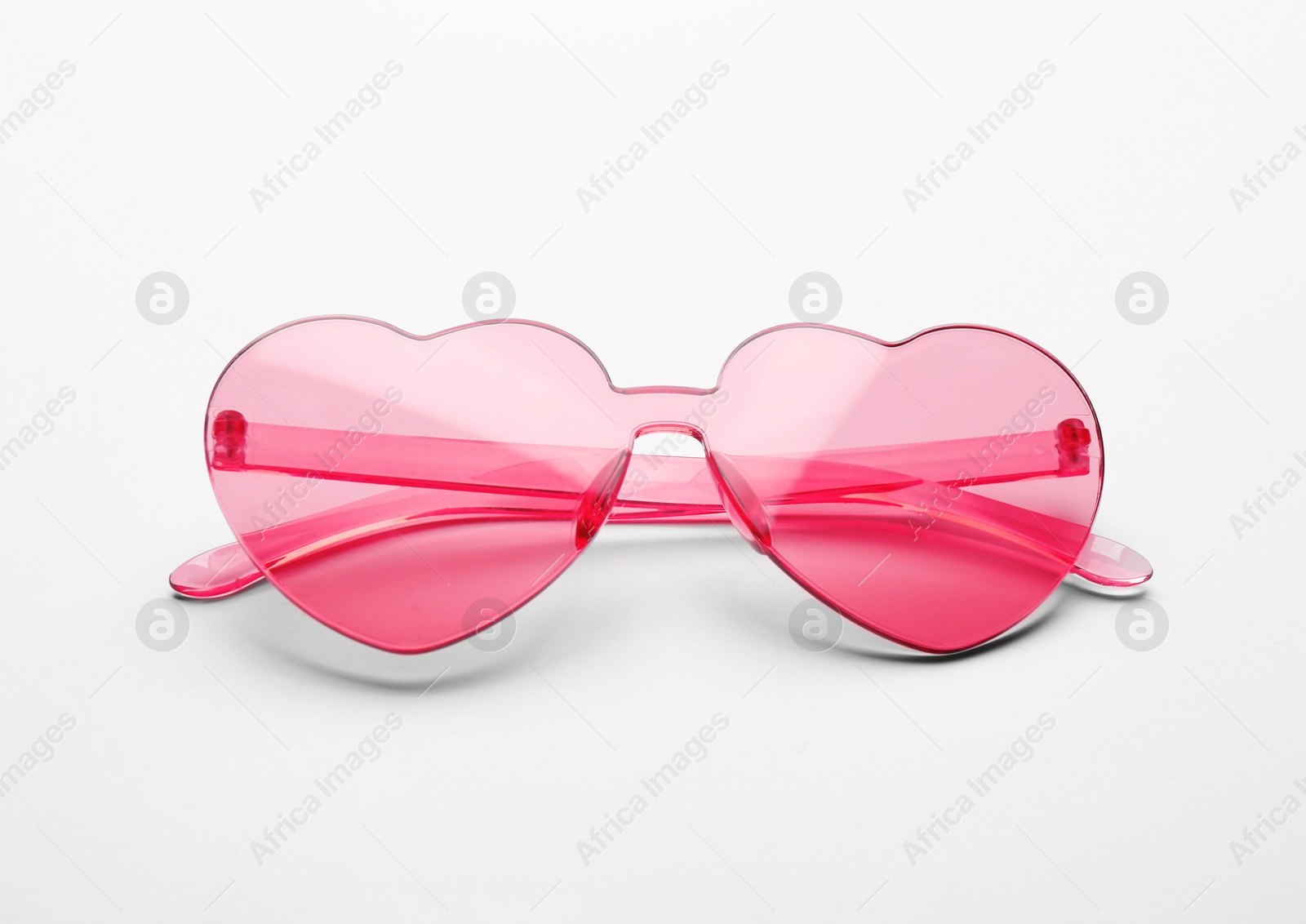 Photo of Stylish sunglasses on white background. Fashionable accessory