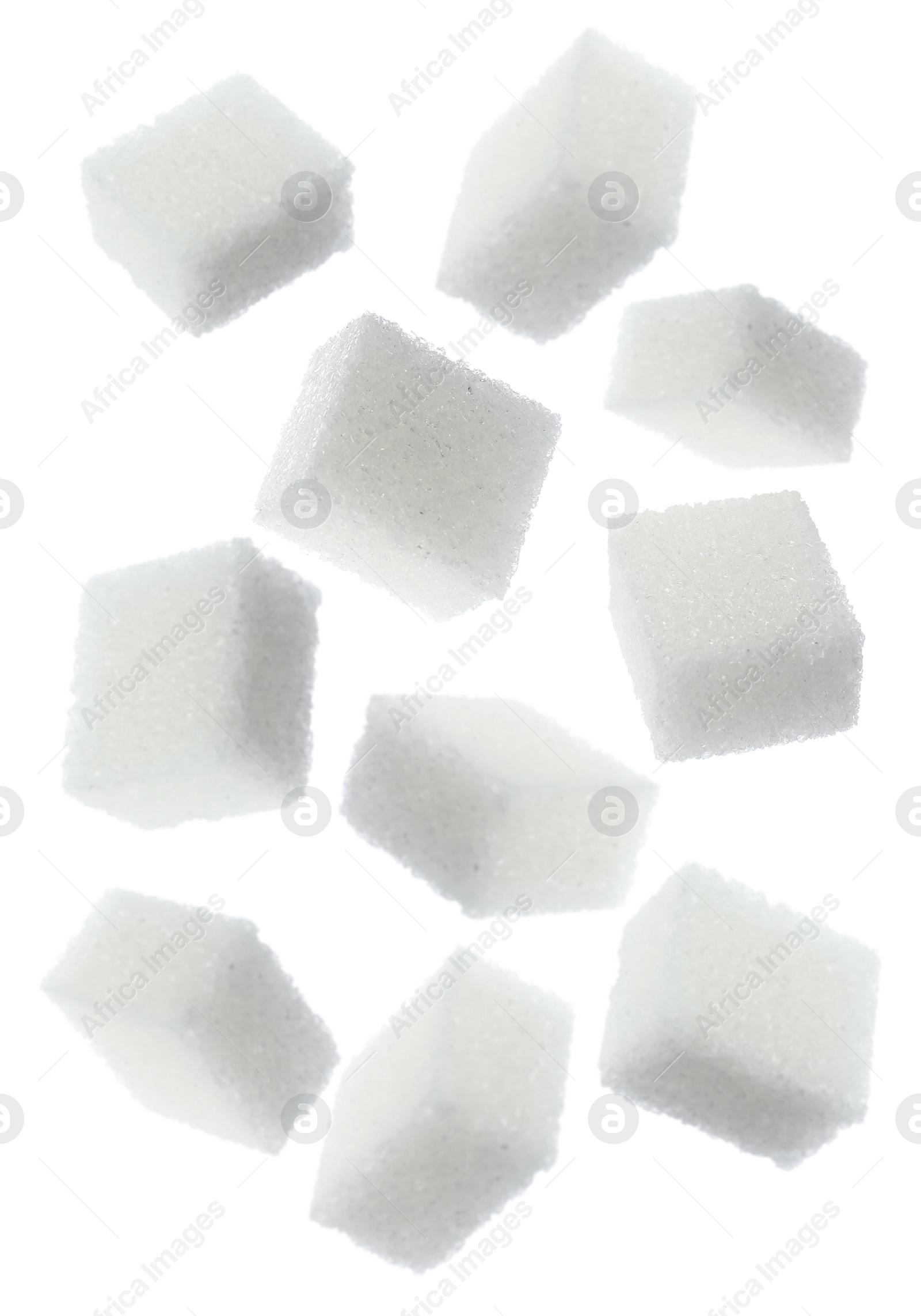 Image of Flying cubes of sugar on white background