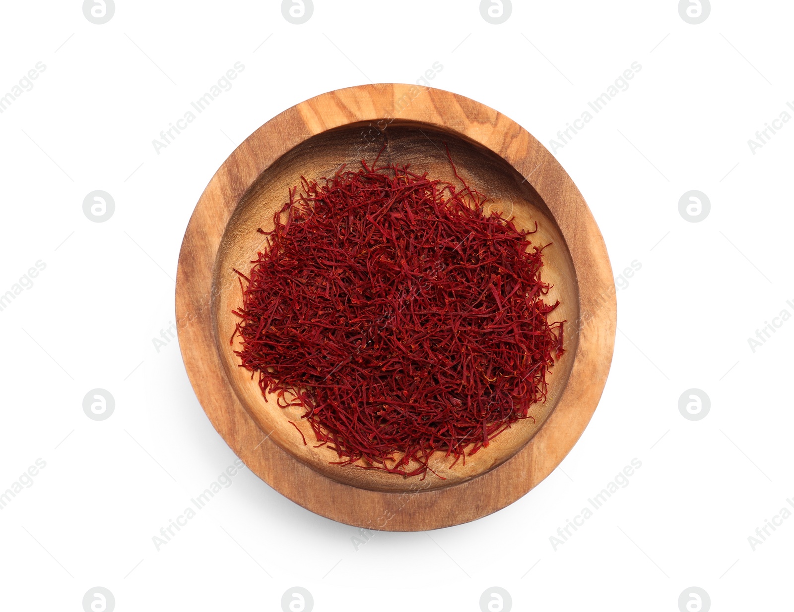 Photo of Aromatic saffron in bowl isolated on white, top view