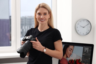 Professional photographer with modern digital camera indoors