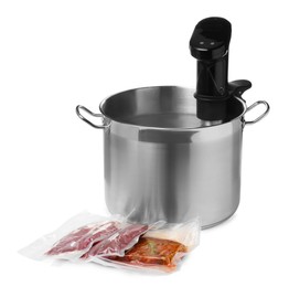 Photo of Thermal immersion circulator in pot and meat on white background. Vacuum packing for sous vide cooking