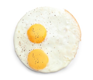 Photo of Fried sunny side up egg on white background, top view