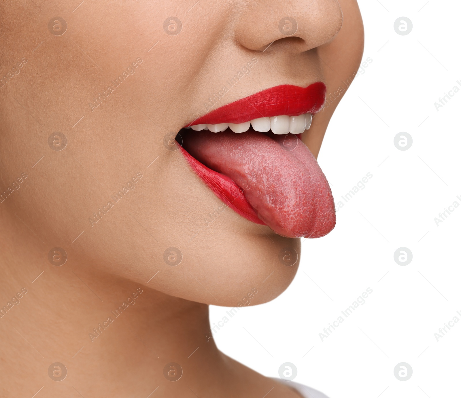 Photo of Woman showing her tongue on white background, closeup