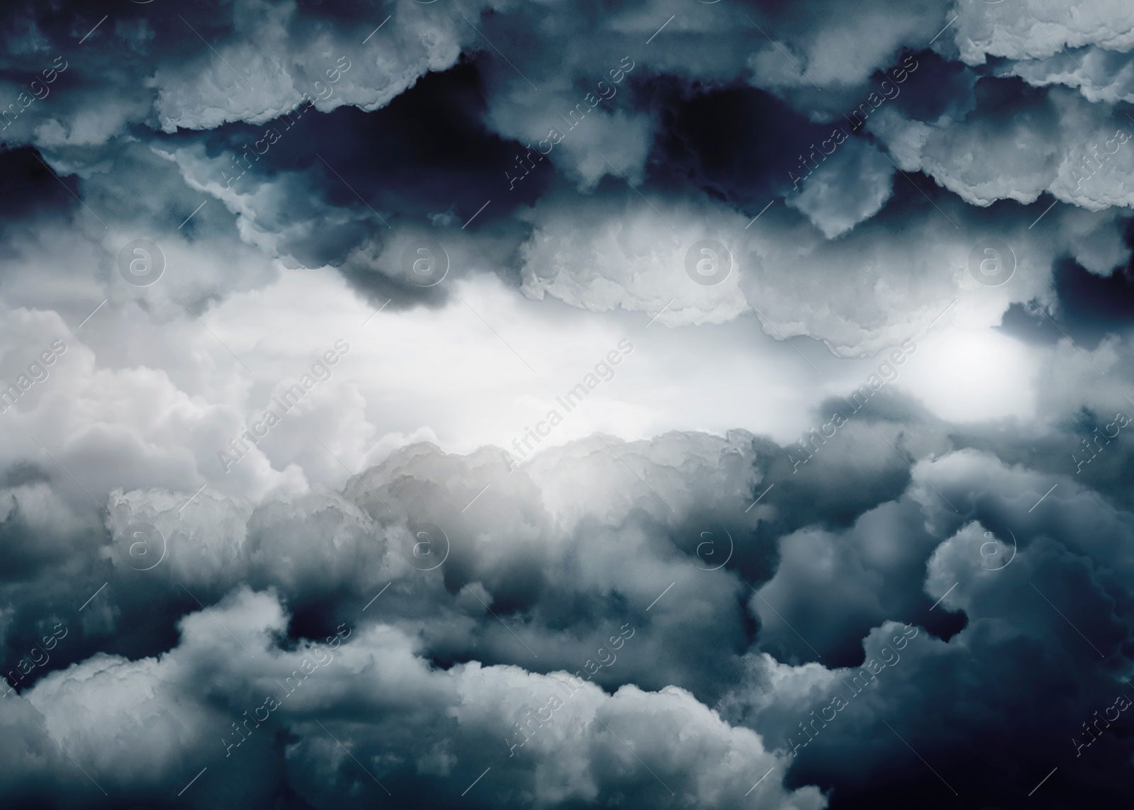 Image of Beautiful view of sky covered with grey thunderclouds