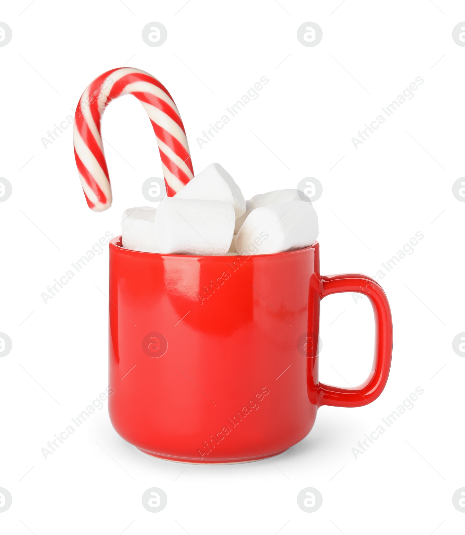 Photo of Cup of tasty cocoa with marshmallows and Christmas candy cane isolated on white