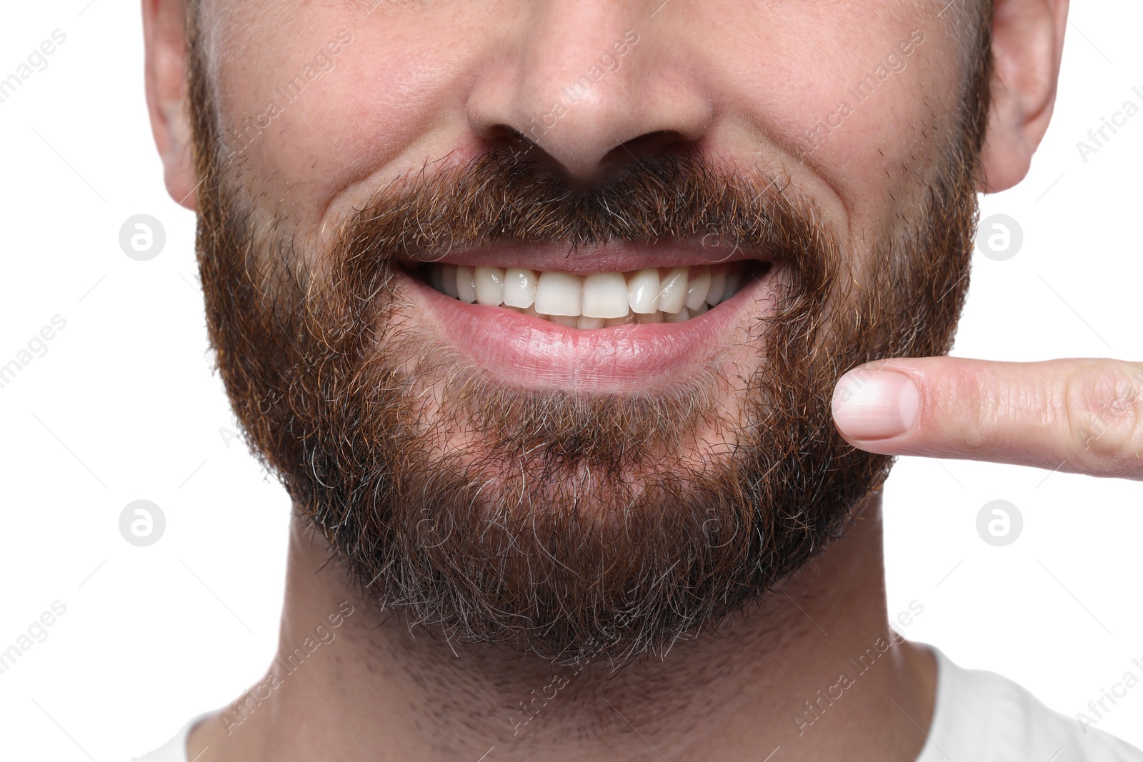 Photo of Man showing healthy gums on white background, closeup