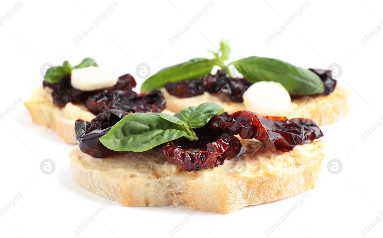 Photo of Delicious tomato bruschettas on white background. Traditional Italian antipasto