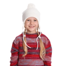 Cute little girl in warm sweater and hat on white background. Winter season