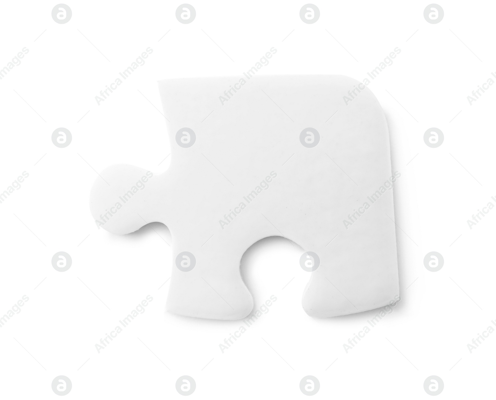 Photo of Blank puzzle piece isolated on white, top view