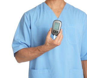 Photo of Male doctor holding glucose meter on white background, closeup. Medical object